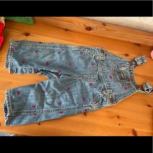 Denim overalls with purple butterflies